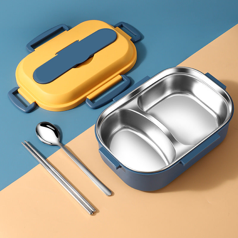 Lunch box open with two compartments and tableware